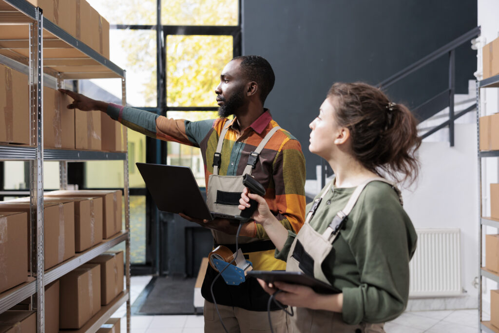 Workers using a warehouse collaboration system